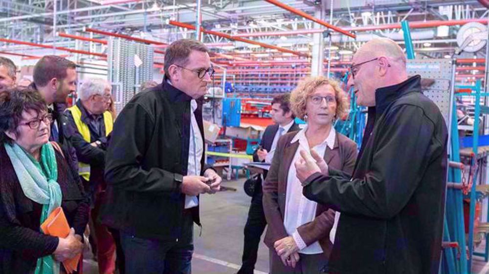 Une ministre à l'usine Une ministre à l'usine