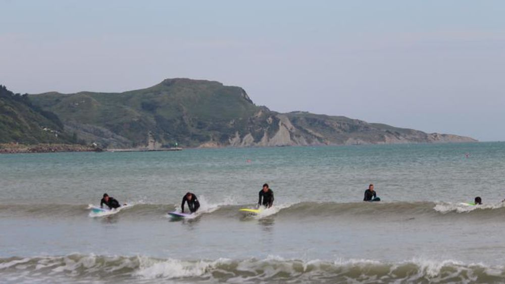 Quinze éleveurs dans les vagues pour se détendre et se rassembler. © DR